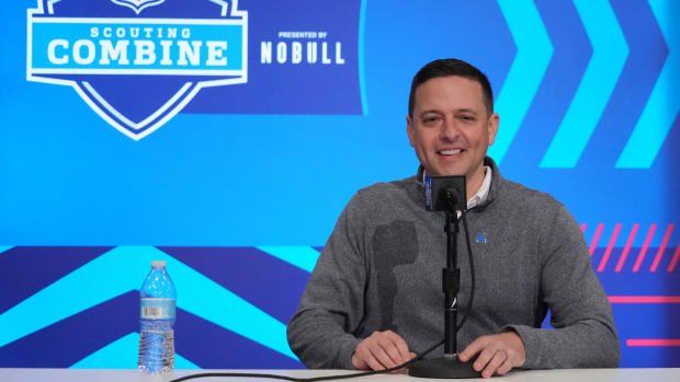 Eliot Wolf sits in front of a microphone
